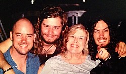 My mom with our friends of the band RavenEye. (L-R: Aaron Spiers, Adam Breeze, mom, Oli Brown)
